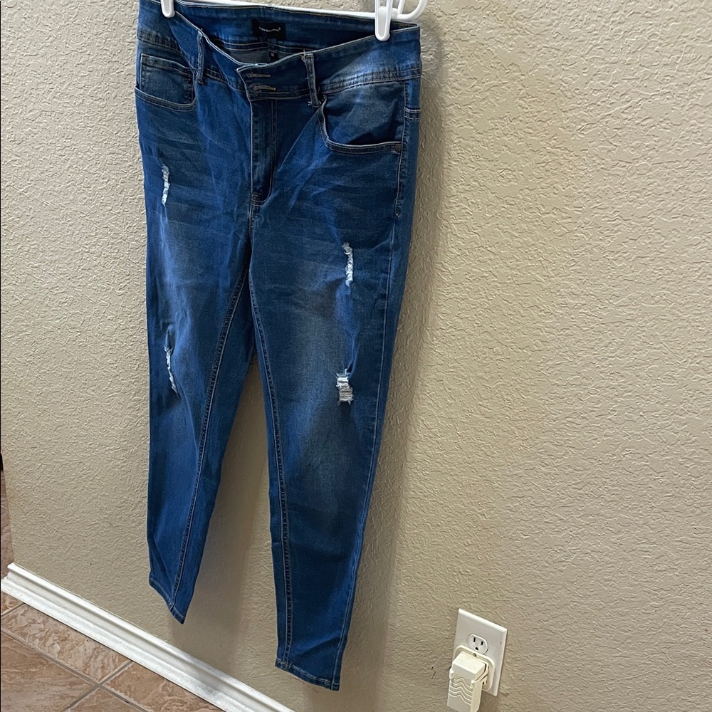 High-Rise Distressed Skinny Jeans in Dark Blue